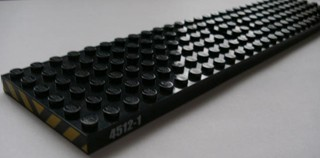 4093apb01 | Train Base 6 x 28 with 3 Round Holes Each End and 1 x 2 Cutouts with Black / Yellow Danger Stripes | LEGOPART