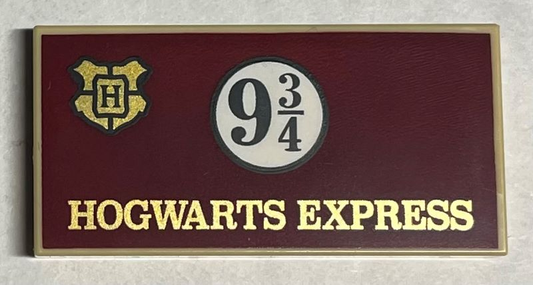 87079pb1017 | Tile 2 x 4 with Gold 'HOGWARTS EXPRESS' and Crest, Black 9 3/4 in Circle on Dark Red Background Pattern | LEGOPART